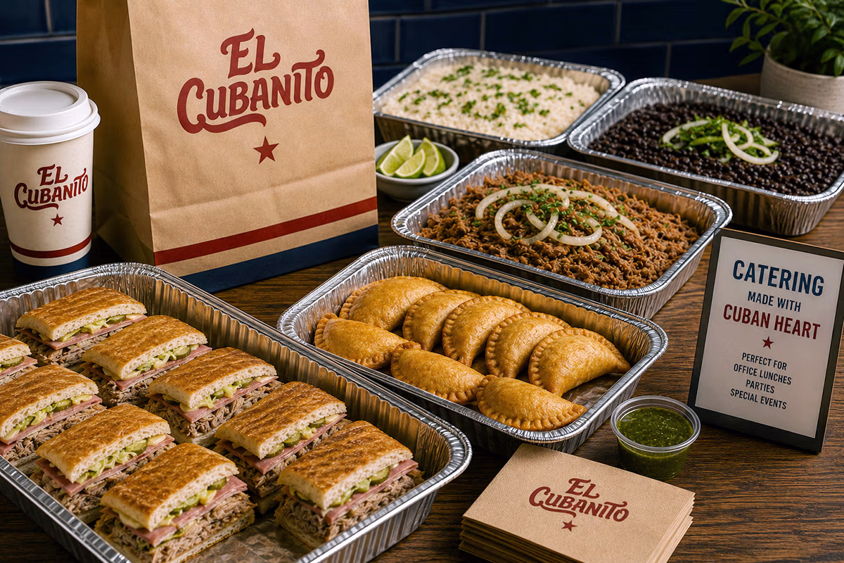 Cuban catering trays with sandwiches, empanadas, rice, beans, and traditional favorites from El Cubanito.